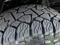 Close-up of a rugged tire tread pattern designed for off-road traction on a 2019 RAM 1500
