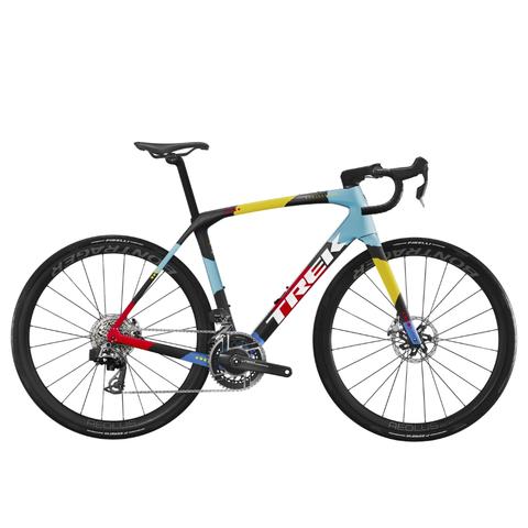 2025 Trek Domane SLR 9 AXS Gen 4 road bike featuring a sleek frame with a blue yellow and red color scheme along with disc brakes and high-performance components