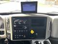Interior dashboard of a 2017 International WorkStar 7600 featuring various controls gauges and a mounted display screen