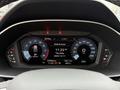 Dashboard display of a 2024 Audi Q3 showing speedometer, tachometer, and various control indicators with time and date information