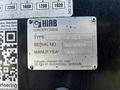 Metal identification plate for a HIAB loader crane displaying type, serial number, and manufacturing year