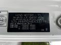 A vehicle information label for a 2014 Hino 195 detailing weight specifications and the VIN