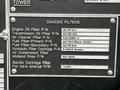A metal plaque detailing chassis filter specifications for a 1991 Sutphen Deluge with labeled sections for various filter part numbers