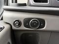Control panel of a 2020 Ford Transit featuring knobs and buttons for lights and other settings