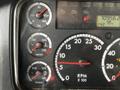Dashboard of a 2012 Freightliner M2 106 displaying gauges for oil pressure water temperature and transmission temperature with odometer readings