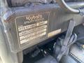 A metal identification plate displaying the specifications and serial number of a 2018 Kubota RTV-X 1100 C utility vehicle
