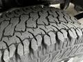 Close-up of a rugged tire tread on a 2020 Mercedes-Benz Sprinter showcasing deep grooves and textured surface for traction