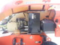 A 2008 JLG Boom Lift showcasing its hydraulic system and gasoline engine components
