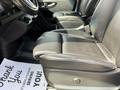 2019 Mercedes-Benz Sprinter interior showing black leather driver seat and dashboard with steering wheel and seat adjustment controls