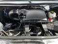 A 2012 Mercedes-Benz Sprinter engine with various components including an air intake and hoses visible