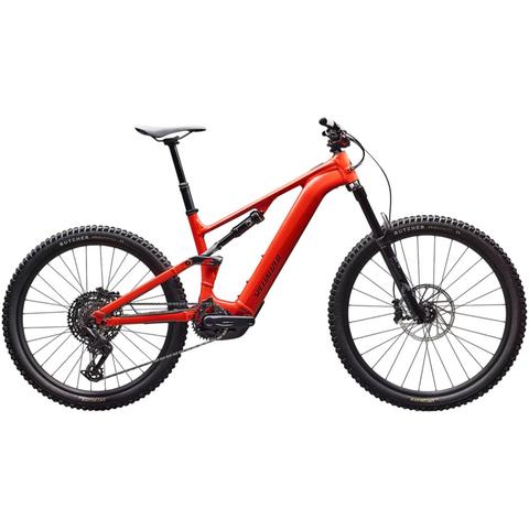 A 2026 Specialized Turbo Levo 4 Alloy Mountain Bike featuring a sleek red frame wide tires and a modern design suitable for off-road cycling
