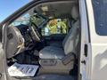 Interior view of a 2016 Ford F-550 showing the driver's seat and dashboard with gray upholstery and controls