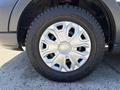 A close-up view of a 2016 Ford Transit wheel featuring a silver and black rim with a Michelin Agilis tire