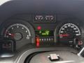 Dashboard of a 2015 Ford Econoline showing speedometer fuel gauge and RPM gauge with odometer reading 150278 km