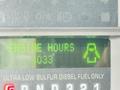Dashboard display showing engine hours of a 2008 Ford F-450 SD indicating 4033 hours with an icon of a truck silhouette