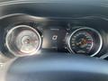 Dashboard of a 2017 Dodge Charger displaying speedometer and tachometer with digital speed readout and other gauges