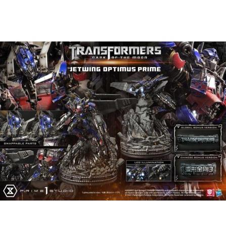 A detailed Jetwing Optimus Prime statue from Transformers: Dark of the Moon featuring swappable parts and LED illumination