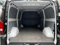 Interior cargo space of a 2023 Mercedes-Benz Metris van with a flat floor and minimal features