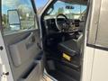 Interior view of a 2018 Chevrolet Express showing the driver's seat steering wheel and dashboard