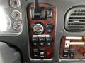 Dashboard controls of a 2006 Freightliner M2 112 featuring gauges switches and buttons for various functions including air bags and power take-off