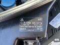 Label for R-134a refrigerant on a 2019 Mercedes-Benz Sprinter engine compartment indicating weight and environmental impact details