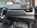 Interior dashboard of a 2016 Chevrolet Tahoe showing the center console air vent and control panel with a black and silver design