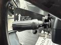 A gear shifter lever labeled with F-N-R and numbers 1 to 3 for a 2011 John Deere 310SJ 4x4 Wheel Loader Extended Hoe 4 in 1