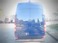 A blue 2017 Mercedes-Benz Sprinter van viewed from the rear featuring the logo and model name on the back doors