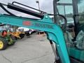 2024 AGT Industrial Green QH13R Mini Excavator with a bright green arm and clearly visible AGT Industrial branding