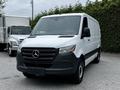 2020 Mercedes-Benz Sprinter van in white with a black front grille and bumper parked in a lot