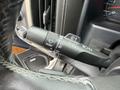 A close-up of the windshield wiper control stalk in a 2017 Chevrolet Silverado 1500 with icons for front and intermittent settings