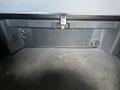 Interior cabin storage space in a 2022 Freightliner Cascadia featuring a flat surface with controls and ventilation grille