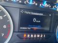 A digital speedometer display showing 0 km/h and a mileage reading of 253834.7 km in a 2017 Ford F-150