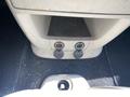 Two power outlets are visible on the interior console of a 2020 Dodge Grand Caravan with one outlet covered by a cap