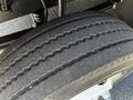 Close-up of a worn tire from a 2009 Morgan Olson Workhorse showing visible tread patterns and wear indicating use