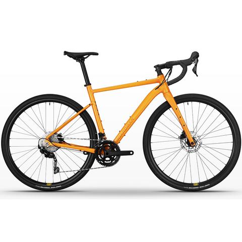 2026 Boardman ADV 8.9 Aluminium Gravel Adventure Road Bike in orange with drop handlebars and disc brakes
