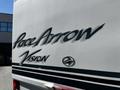2000 Ford Motorhome with "Pace Arrow Vision" branding displayed on the side