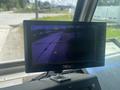 A monitor displaying a rearview camera feed in a 2007 Morgan Olson Workhorse W42 vehicle