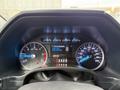The dashboard of a 2020 Ford F-550 showing speedometer fuel gauge engine hours and various warning lights