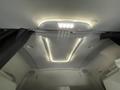 Interior view of a 2022 Freightliner Cascadia sleeper cabin featuring LED lighting and a streamlined ceiling design