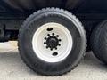 A close-up of a black tire mounted on a white rim with the label AD300 and the name Euroking visible on the sidewall of the tire