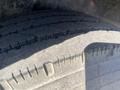 A close-up view of the tread on a tire belonging to a 2024 Southland 18 Foot Dump Trailer
