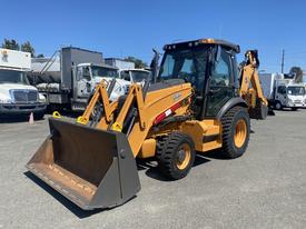A 2016 Case 580 Super N backhoe loader with a yellow and black color scheme featuring a front bucket and a rear excavator arm
