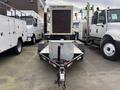 2005 Trailerman Generator Trailer with a diamond plate storage box and a hitch at the front