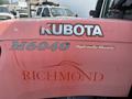2010 Kubota M6040 tractor with a hydraulic shuttle feature and the word Richmond displayed prominently on its side