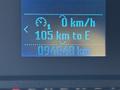 Digital display showing the speed at 0 km/h remaining distance of 105 km to empty and a total of 094848 km driven