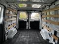 Interior of a 2023 Ford Transit van showing wooden shelving supports installed along the sides of the cargo area