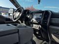 Interior view of a 2021 Ford F-550 showcasing the front dashboard with a touchscreen display and steering wheel