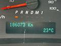 The dashboard display of a 2015 Chevrolet Express showing the odometer reading 186073 km and a temperature reading of 23 degrees Celsius