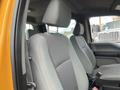 Interior view of a 2017 Ford F-250 SD showing gray front seats with fabric upholstery and a headrest